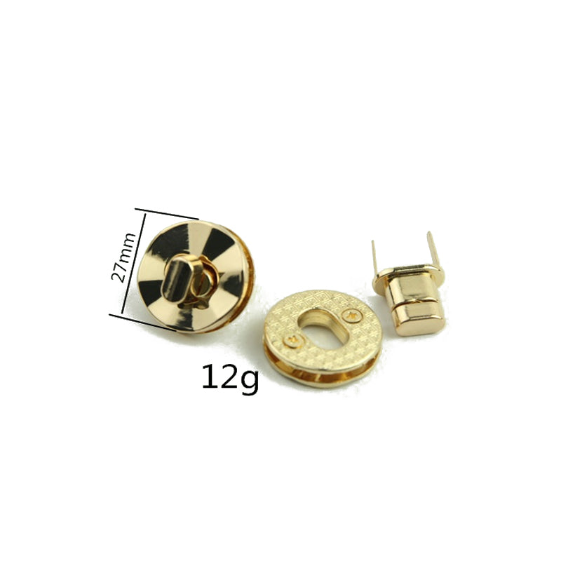 Light gold round shape bag metal turn locks