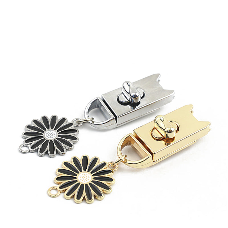 Light gold & silver bag turn locks