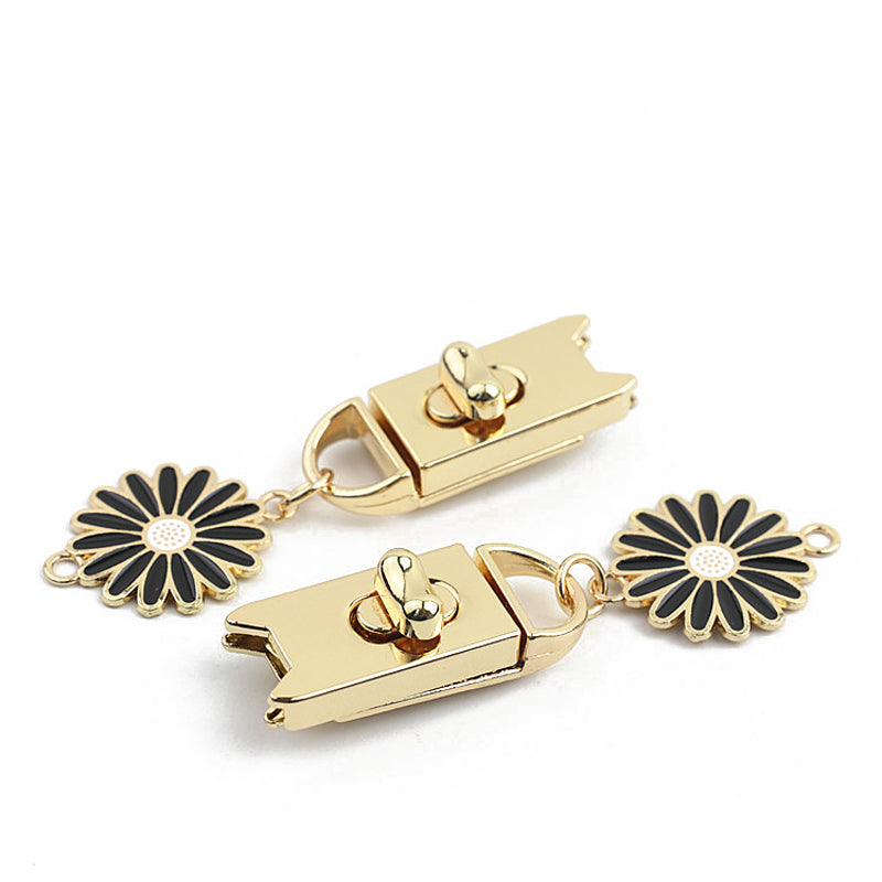 Light gold & silver bag turn locks