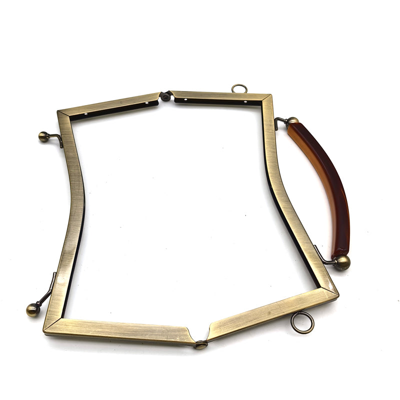 Exquisted customized hanging brush anti brass round ball kiss lock resin handle purse bag metal frame 21CM