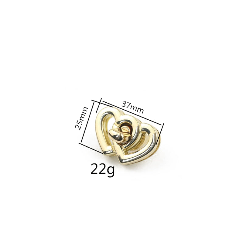 Double heart intersecting metal twist bag lock