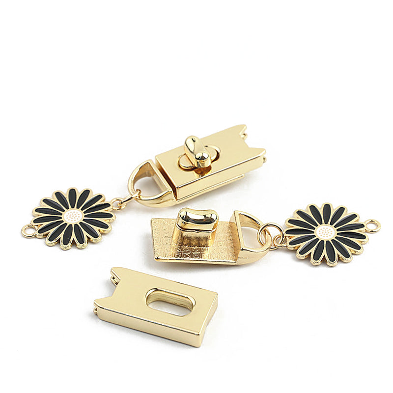Light gold & silver bag turn locks