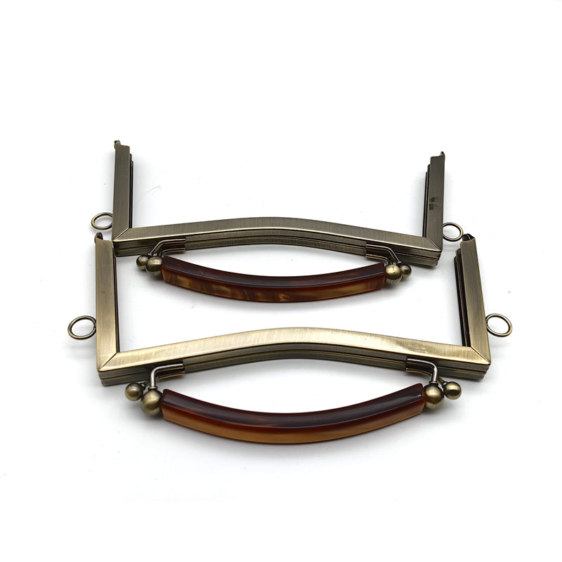 Exquisted customized hanging brush anti brass round ball kiss lock resin handle purse bag metal frame 21CM