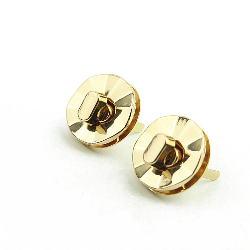 Light gold round shape bag metal turn locks