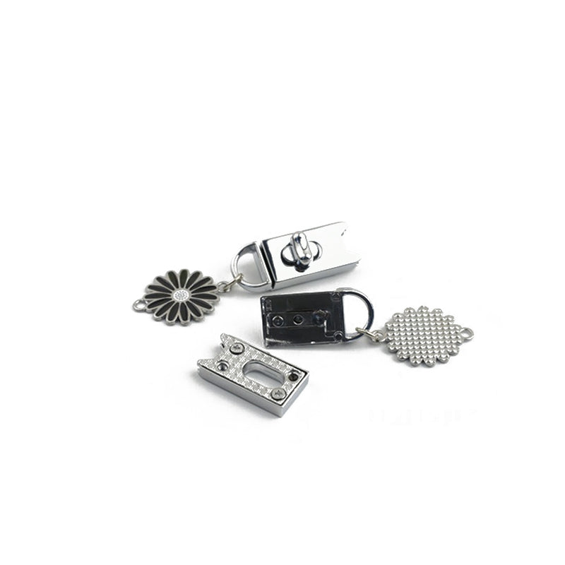 Light gold & silver bag turn locks