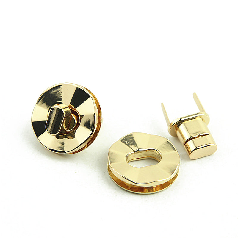 Light gold round shape bag metal turn locks
