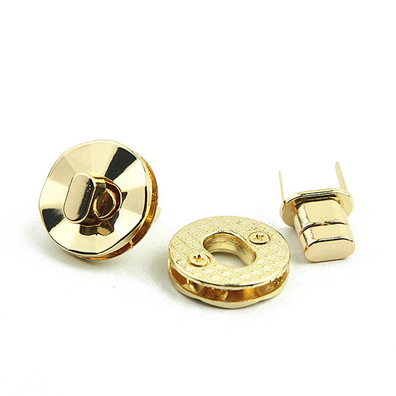 Light gold round shape bag metal turn locks