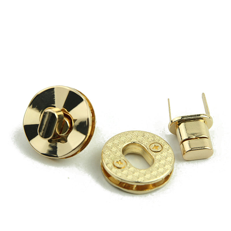 Light gold round shape bag metal turn locks