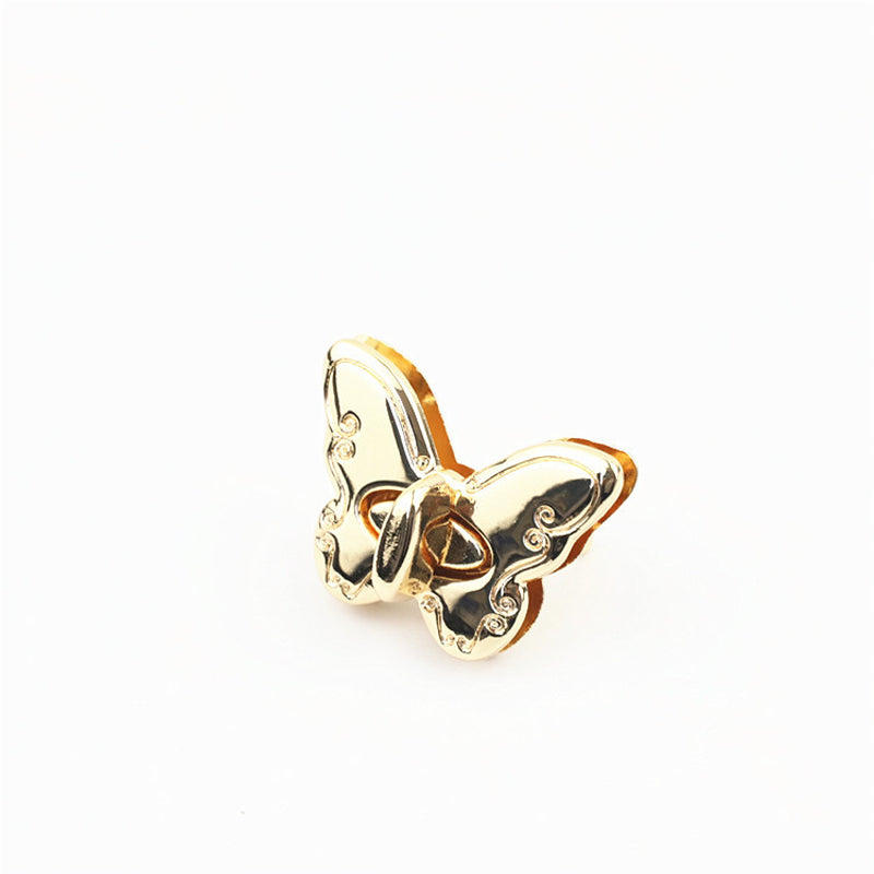 Butterfly shape metal claps twist turn locks for bag