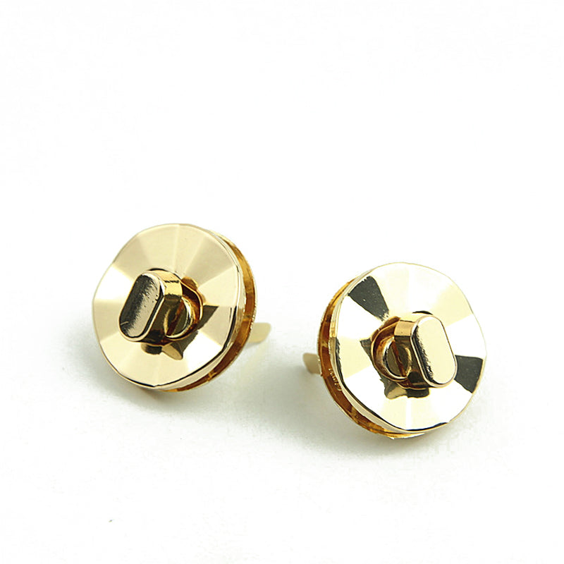Light gold round shape bag metal turn locks
